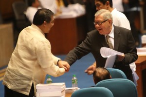 House Indpendent Minority Bloc leader and Leyte (1st Dist) Rep. Ferdinand Martin "FM" Romualdez (left) congratulates House Speaker Feliciano "Sonny" Belmonte Jr. (right) after the House of Representatives has approved on third reading a bill that would increase the tax exemption ceiling of workers' bonuses.photo by Ver Noveno
