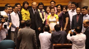 Pacquiao hailed •November 23, 2014 •	Written by Ryan Ponce Pacpaco E. Montano, Bernadette E . Tamayo •	Published in Top Stories •	0comments COLLEAGUES of Sarangani Rep. Manny “Pacman” Pacquiao at the House of Representatives congratulated him for dominating American challenger Chris Algieri to retain his World Boxing Organization (WBO) welterweight  title during the “Hungry for Glory” boxing extravaganza at the Cotai Arena inside The Venetian Macao Sunday afternoon.       House independent bloc leader and Leyte Rep. Ferdinand Martin Romualdez said Pacquiao’s victory is another indisputable proof that he is a world-class athlete.      “Pacquiao proved that with solid determination and hard work, the Filipino can triumph over anybody or anything anytime. We extend our unfathomable congratulations to Congressman Pacquiao,” said Romualdez.      Speaker Feliciano “Sonny” Belmonte Jr. said: “Pacquiao has solidified his legend as our country’s greatest boxing icon. Yet, it is his humility and generosity which make him larger than life to our people”   House Majority Leader and Mandaluyong City Rep. Neptali “Boyet” Gonzales II: “His new victory will further inspire Filipinos to”persevere in life. That’s would make us very proud of our race.”Congratulations to him.”      Cavite Rep. Elpidio “Pidi” Barzaga Jr.: “The Filipinos are really”very proud to have the best boxer in the world. Hoping that Manny Pacquiao with his earnings in the Algieri’s fight would not have additional woes with the BIR (Bureau of Internal Revenue).” Quezon City Rep. Winston “Winnie” Castelo: “Manny’s win makes our collective judgment of life look interesting. We are more composed, calm, and circumspect in facing life.”         Romblon Rep. Eleandro Jesus “Budoy” Madrona: “Congressman Manny’s victory was expected because of his superb performance. It was another masterful showing of his boxing skills.”      You Against Corruption and Poverty party-list Rep. Carol Jane Lopez: “Congratulations to Congressman Manny for another convincing victory. Katabi ko si Mommy D (Dionesia) kaya super kabado kami!”      Isabela Rep. Rodolfo “Rodito” Albano III: “We congratulate Congressman Pacquiao for another glory. He is the best.” Eastern Samar Rep. Ben Evardone: “It was a superb performance of an icon.”      Marikina City Rep. Miro Quimbo:  “What a true icon. It is my first time to watch a boxing match live. We never realize how much danger they put themselves in when they go up the ring. You only see it when you’re there for real. It cannot just be for money. He’s truly doing it for God and country. Mabuhay ka Manny.”      House Deputy Majority Leader and Citizens Battle Against Corruption (Cibac) party-list Rep. Sherwin Tugna: “Thank you to our national icon for bringing honor and glory to our country! He is our symbol that we Filipinos are the best in the world.”      Davao City Rep. Karlo Nograles:  “He is back!! The fire is back!! Our People’s Champ Rep. Manny Pacquiao has shown to the world that if you put your heart and mind into it you can accomplish anything! With this victory Manny displayed the true spirit of the Filipino -- our ability to get up and rise up after a fall. Manny is now ready for (Floyd) Mayweather! Mabuhay ka Manny Pacquiao! Mabuhay ang Pilipino!””      Western Samar Rep. Mel Senen Sarmiento: “The victory of Manny Pacquiao once again gave our nation so much pride and the reason to celebrate our nationhood. It is also a clear statement from our boxing hero that he is still a strong fighter. I just wish that this time, Floyd Mayweather would finally agree to face him inside the ring.”      Iloilo Rep. Jerry Treñas: “Manny Pacquiao is the national symbol of unity. Every time he fights the whole nation watches together, praying for his victory, the victory of the Filipino and the nation. He makes us proud to be Filipinos. The fight clearly refutes claims that Manny Pacquiao should now retire from boxing. He is still has a fist like steel  and a speed like lightning.  Once again, Manny gifted us with a very rare moment where our nation is united and free from partisanship.”      Democratic Independent Workers’ Association (DIWA) party-list Rep. Emmeline Aglipay: “Congratulations. Thank you for making the Filipino people proud. We saw the fire in you and we salute you for preparing so hard for this fight. We look up to you not only because you are the best boxer but more because you remain humble through all your accomplishments.”      Magdalo party-list Rep. Ashley Acedillo: “Cong. Manny Pacquiao said it best himself: in Jesus’ mighty name, He gave me strength, He protected me, and He gave me this victory. Congrats to our Pambansang Kamao and thanks for a great fight!”      Ako Bicol party-list Rep. Rodel Batocabe” “Isang malaking karangalan na naman ang ibinigay ni Pacquiao. Si Mayweather na lang para  happy tayo lahat. Win or lose.”            ‘Strength,  grit, courage’          Malacañang hailed the convincing and world class triumph of Pacquiao over New Yorker Chris Algieri.       “Strength, grit, and courage were written all over his face and demeanor throughout the fight. With every punch that scored, millions of Filipinos cheered him to victory from all corners of the country and the world,” Presidential Communications Secretary Sonny Coloma Jr. said in his note issued to Palace reporters yesterday. Nancy hails Pacman       The People’s Champ once again showed the world why he ranks among the “best” boxers in history.       Sen. Nancy Binay stressed this point following the victory of Pacquiao over Algieri in Macau yesterday.        “Chris Algieri tried to wrest the World Boxing Organization (WBO) welterweight crown away but our country’s fighting pride rose to the occasion to successfully keep one of his many titles,” said Binay.       “Manny, saludo kami sa panibago mong tagumpay! Manny, isa kang inspirasyon sa ating mga kababayan. Patunay ka na kahit anumang pagsubok ang harapin, ito’y mapagtatagumpayan sa tulong ng pagtitiyaga; dedikasyon; at pananalig at pagtitiwala sa sariling kakayahan at sa Maykapal. Mabuhay ka Pambansang Kamao! Mabuhay ang Filipino!” Binay said. 